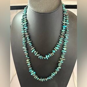Long continuous strand turquoise stone necklace